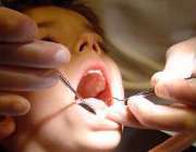 معاینه دندان کودک
