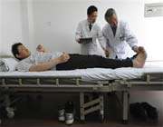 zhao, worlds tallest man in hospital