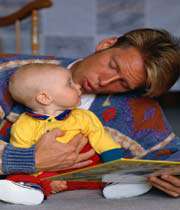 father  reading book for his child