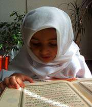 girl reading quran