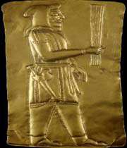 a golden sheet showing a median zoroastrian priest 