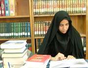 young woman reading books