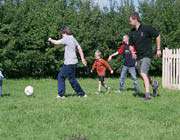 family playing football