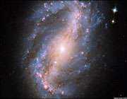 کهکشان مارپیچ بسته ngc 6217