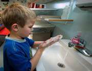 kid washing his hand