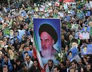 iranians in different cities including capital tehran took to the streets to protest the desecration of imam khomeinis picture.
