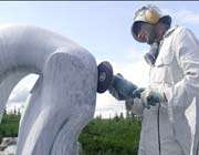 muhammad-reza yazdi working on his sculpture at canadas bergen rocks sculpture symposium