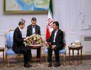 le président ahmadinejad et kinichi komano