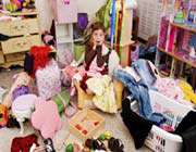 little girl in messy room