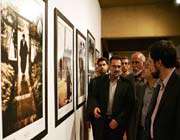culture ministry muhammad husseini (l) and a number of the organizers visit the “light of awareness” exhibition, which displays photos of imam khomeini.