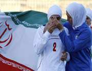 the iranian team was banned from the match on friday in the second round of qualifiers over their hijab.