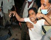 a young yemeni anti-government protester wounded during clashes with security forces in the city of taizz.