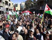 jordanian anti-government protesters shout slogans during a demonstration after friday prayers in the capital amman.