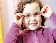 kid wearing glasses