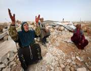 palestinians react after their homes were destroyed by israeli bulldozers in the west bank 