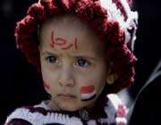 a two-year-old yemeni girl is held by her mother during a demonstration by anti-government protestors in the capital, sana’ a 