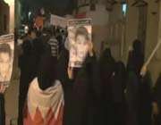 bahrainis carried posters of ali jawad, a teenager who was brutally killed by saudi-backed bahraini forces.