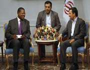 iranian president mahmoud ahmadinejad (r) meets congolese communications minister lambert mende omalanga in tehran.