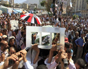 mourners carry the body of a woman in taizz on saturday