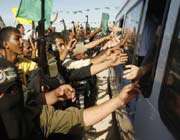 people greet freed palestinian prisoners upon arrival at the rafah crossing in the southern gaza strip.