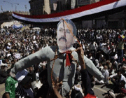 yemeni protesters hold up an effigy of saleh as they shout slogans during an anti-government rally in sana’a.