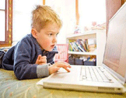 kid working with computer
