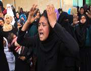 a palestinian relative shouts during the funeral of hamada suleiman abu mutlaq, 24-years-old, who was killed in an israeli airstrike on march 12, 2012.