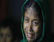 a rohingya muslim woman, whose husband was allegedly killed in myanmar