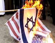 lebanese protesters burn israeli and us flags during a demonstration outside a mosque in the southern city of sidon