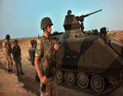 turkish soldiers stand guard in akcakale near the turkish-syria border in southern sanliurfa province, october 4, 2012