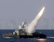 an iranian military boat firing a rocket during the 10-day velayat 90 naval exercise launched on december 24, 2011.