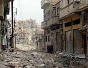 destruction in syria’s central restive city of homs