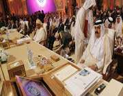 qatars emir hamad bin khalifa al thani (r) attends the opening of the arab league summit in doha on march 26, 2013.