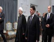 iranian president hassan rohani (l) meets with syrian prime minister wael al-halqi in tehran on august 4, 2013