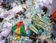 bodies of people, who were crushed in mina, saudi arabia, during the annual hajj pilgrimage, are seen among belongings and empty water bottles.