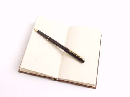 دفترچه یادداشت و خودکار