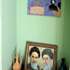 عکس امام  و رهبر در اتاق شهید بهشتی