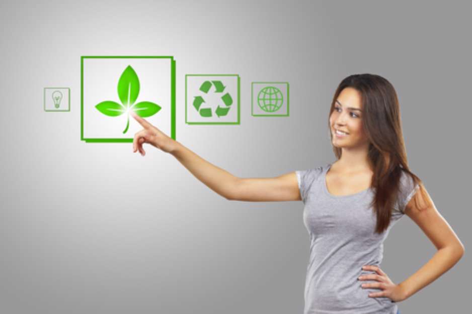 Young businesswoman pointing  recycle symbol, isolated