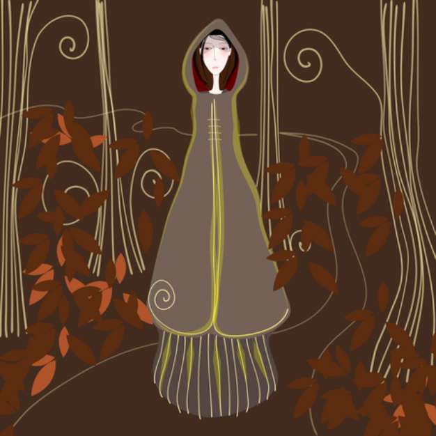 Cute autumn girl strolling through a forest