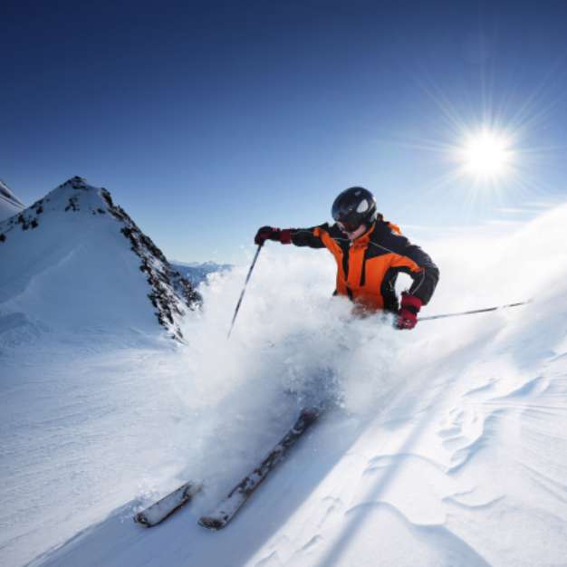 Skier in high mountains
