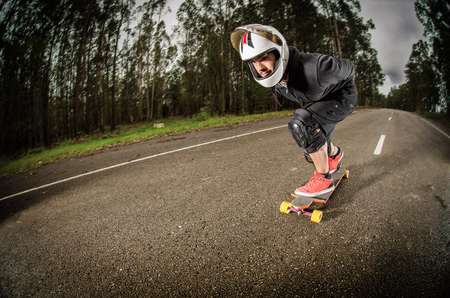 Downhill skateboarder in action
