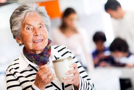 Old woman with a cup of tea