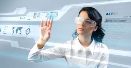 Pretty young lady using new technologies