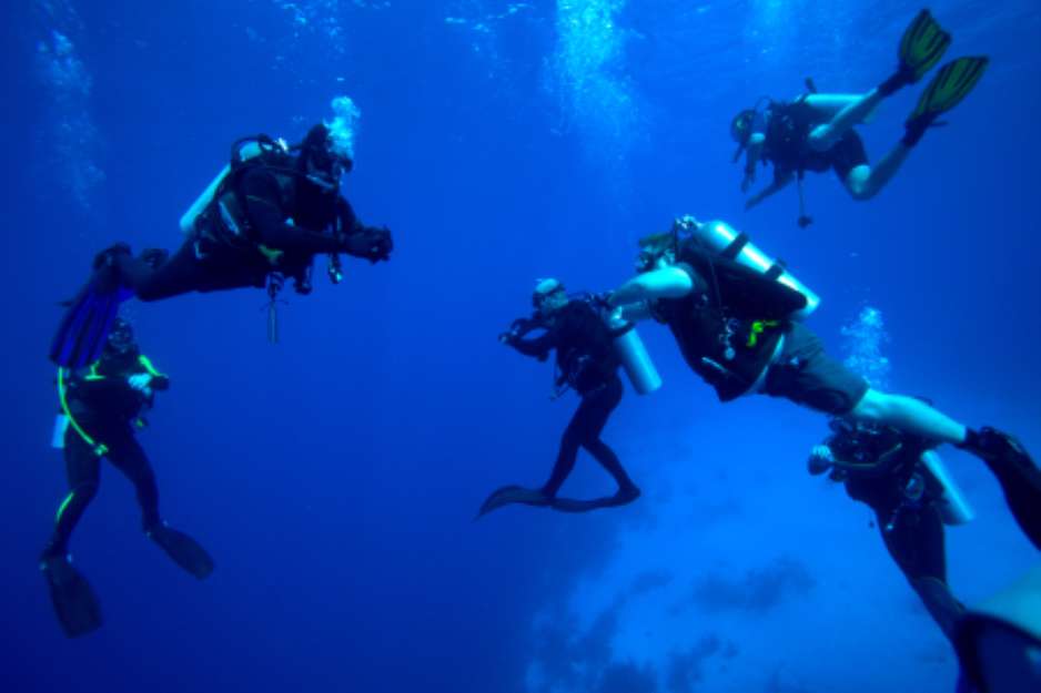 Group of divers on 5-min safety stop, Cuba