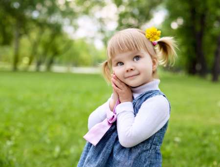 Portrait of a little girl outdoors