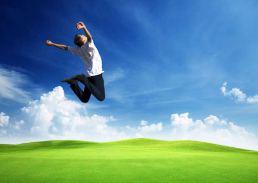 jumping happy young man