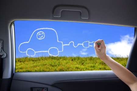 hand drawing Electric car concept on the car windows