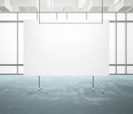 white poster in a bright office