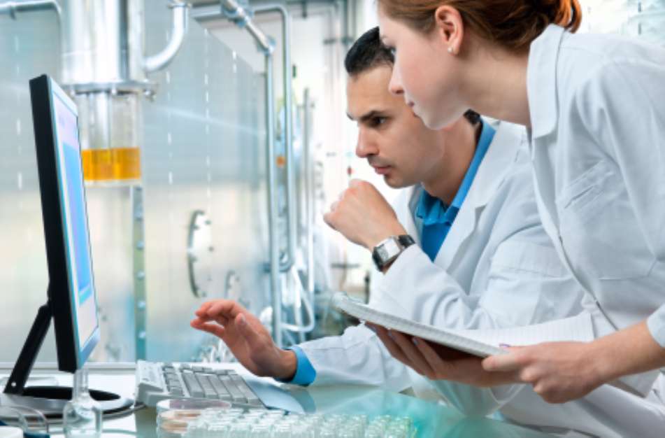 group of scientists working at the laboratory