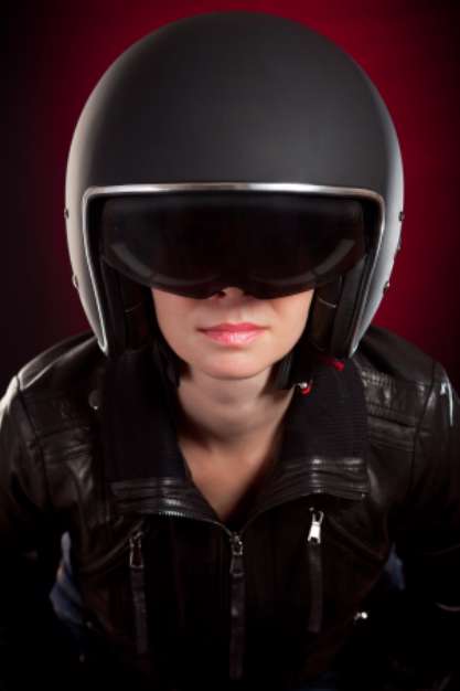 Biker girl in a helmet